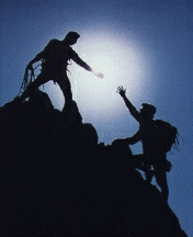 Mountain climber helping a friend